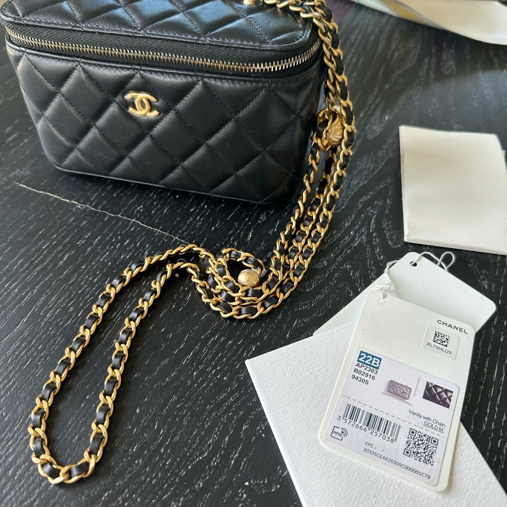 CHANEL Black and Gold vanity bag